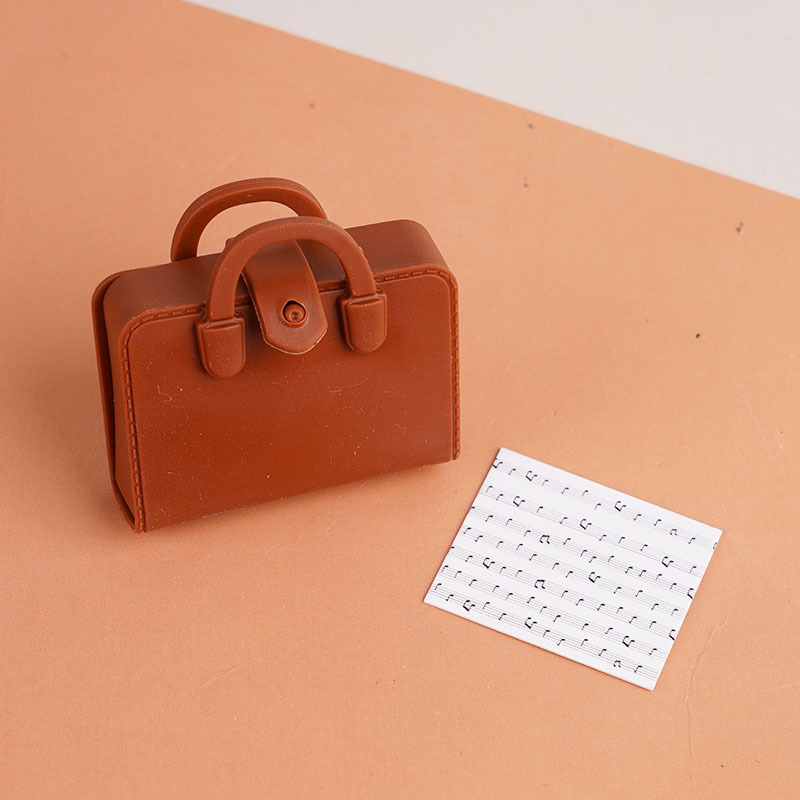 Brown bag + sheet music