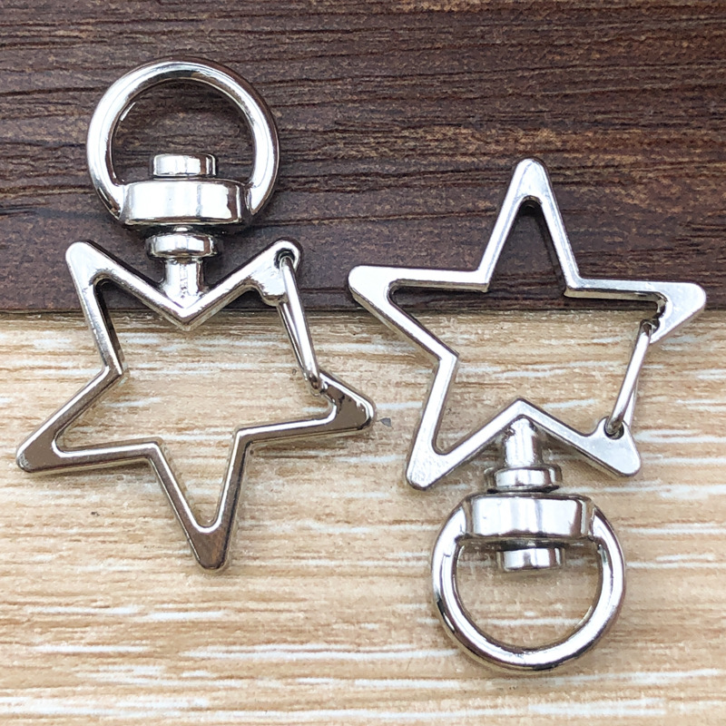 1 llavero estrella blanca/perro, 24*34mm, 3,4g, 12818