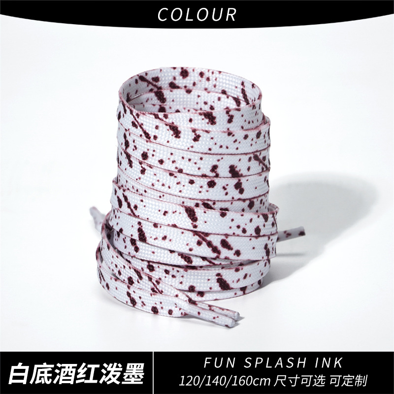 White background with wine red splatter ink