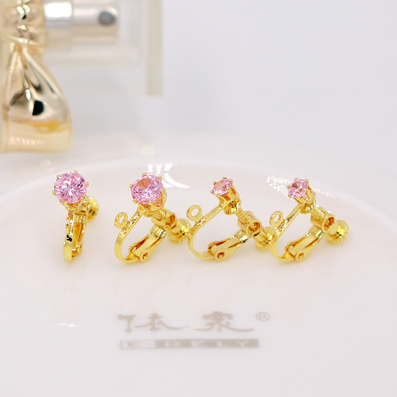 Boucles d'oreilles clip en or 18 carats avec zirconium rose clair