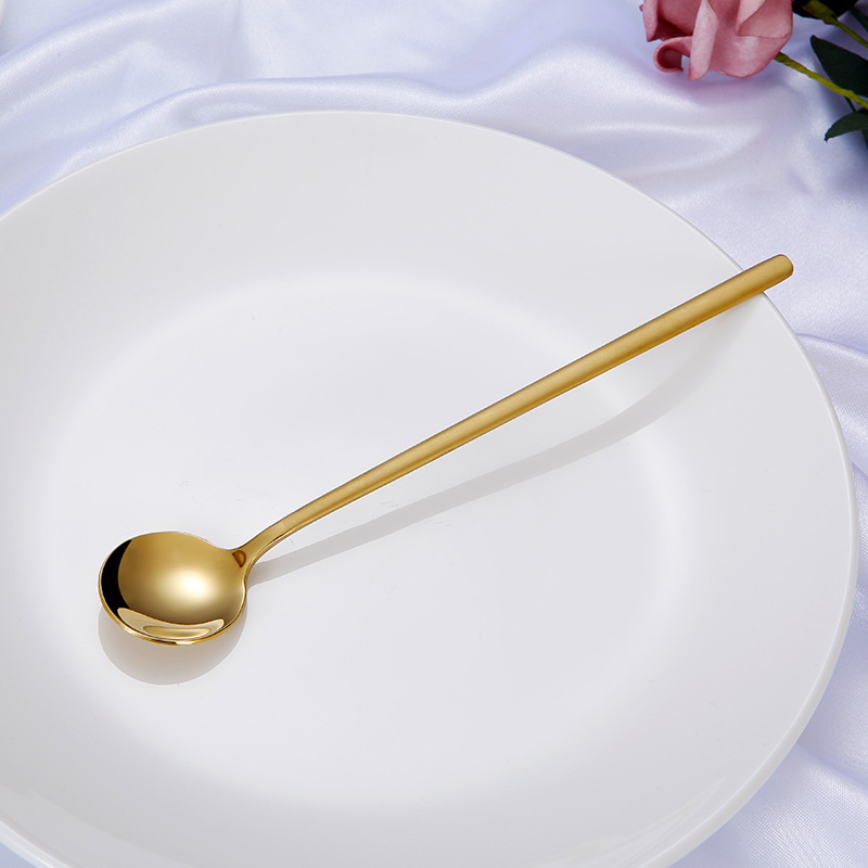Gold long spoon