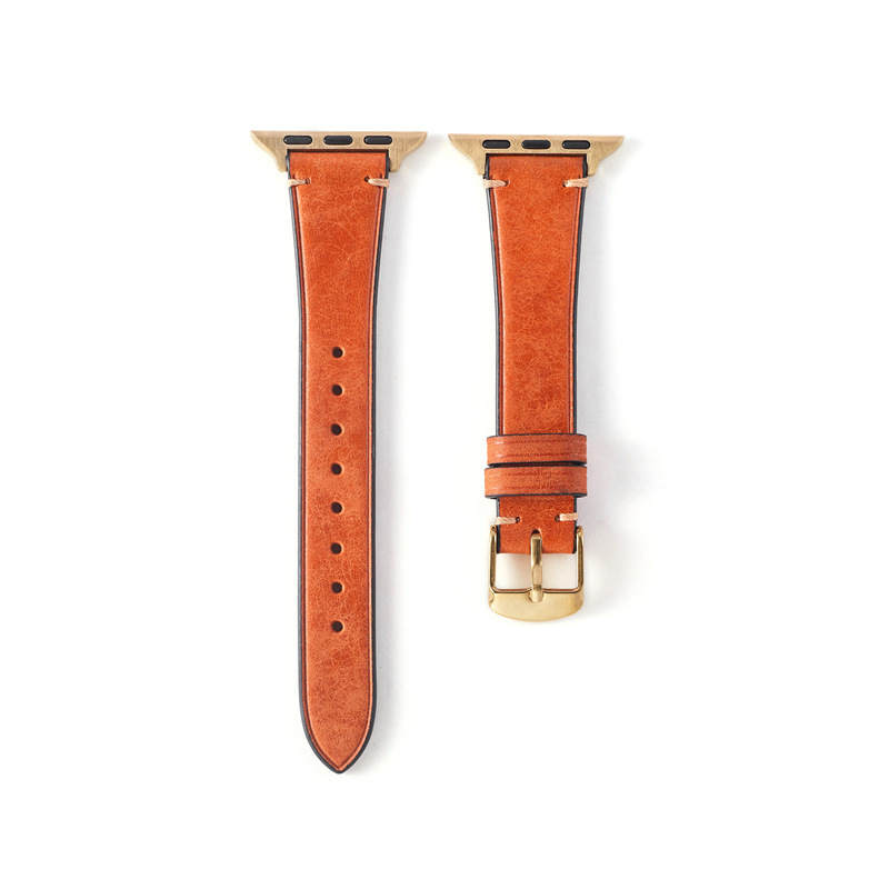 Boucle dorée, bracelet orange.