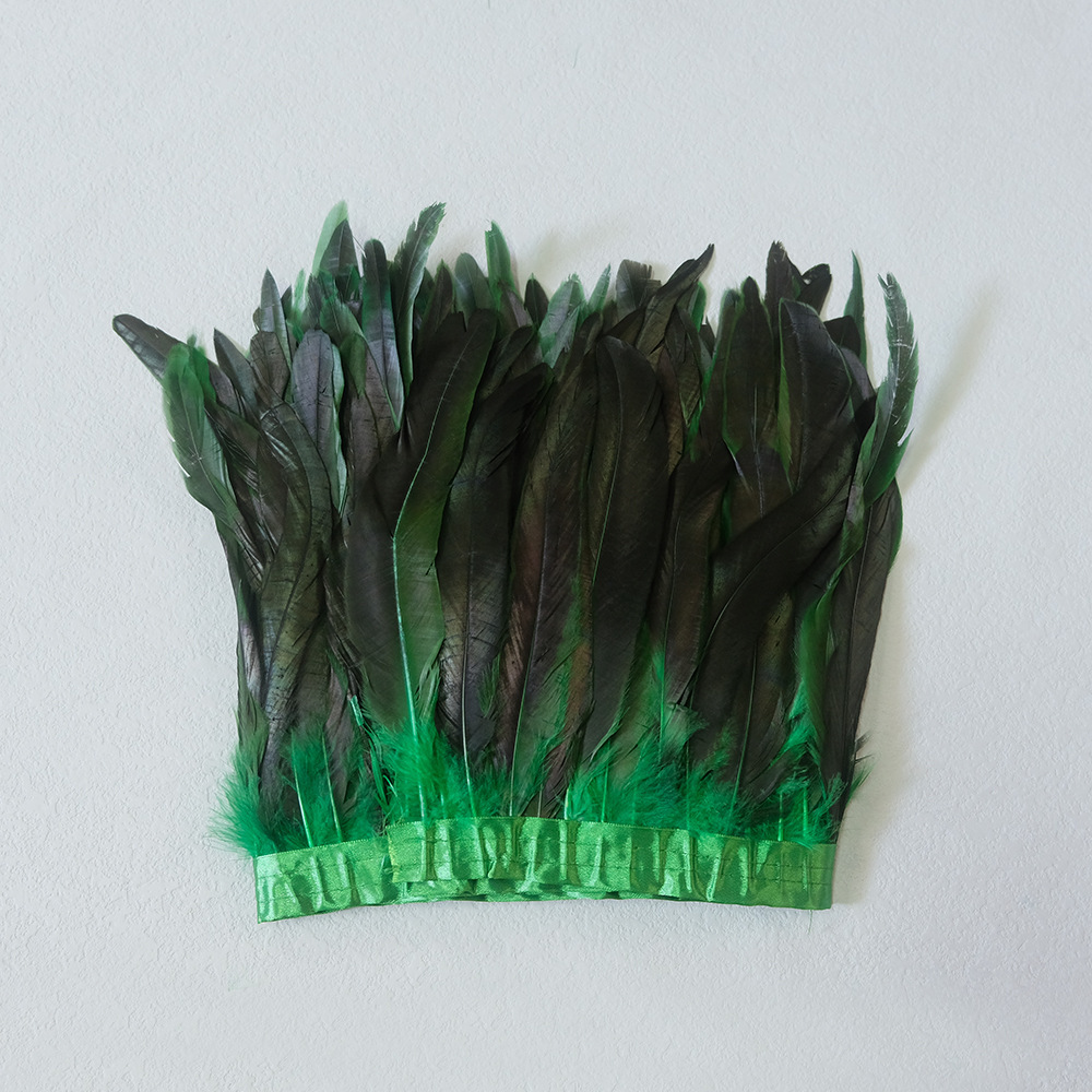 Finges de plumes de coq vert