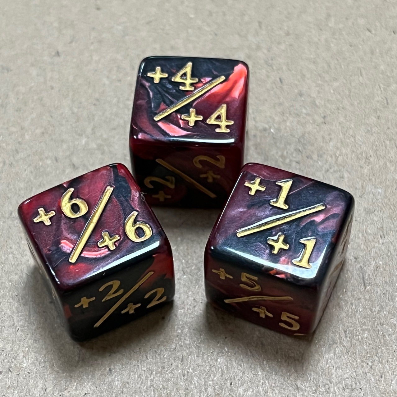 Encre rouge noir / dorée