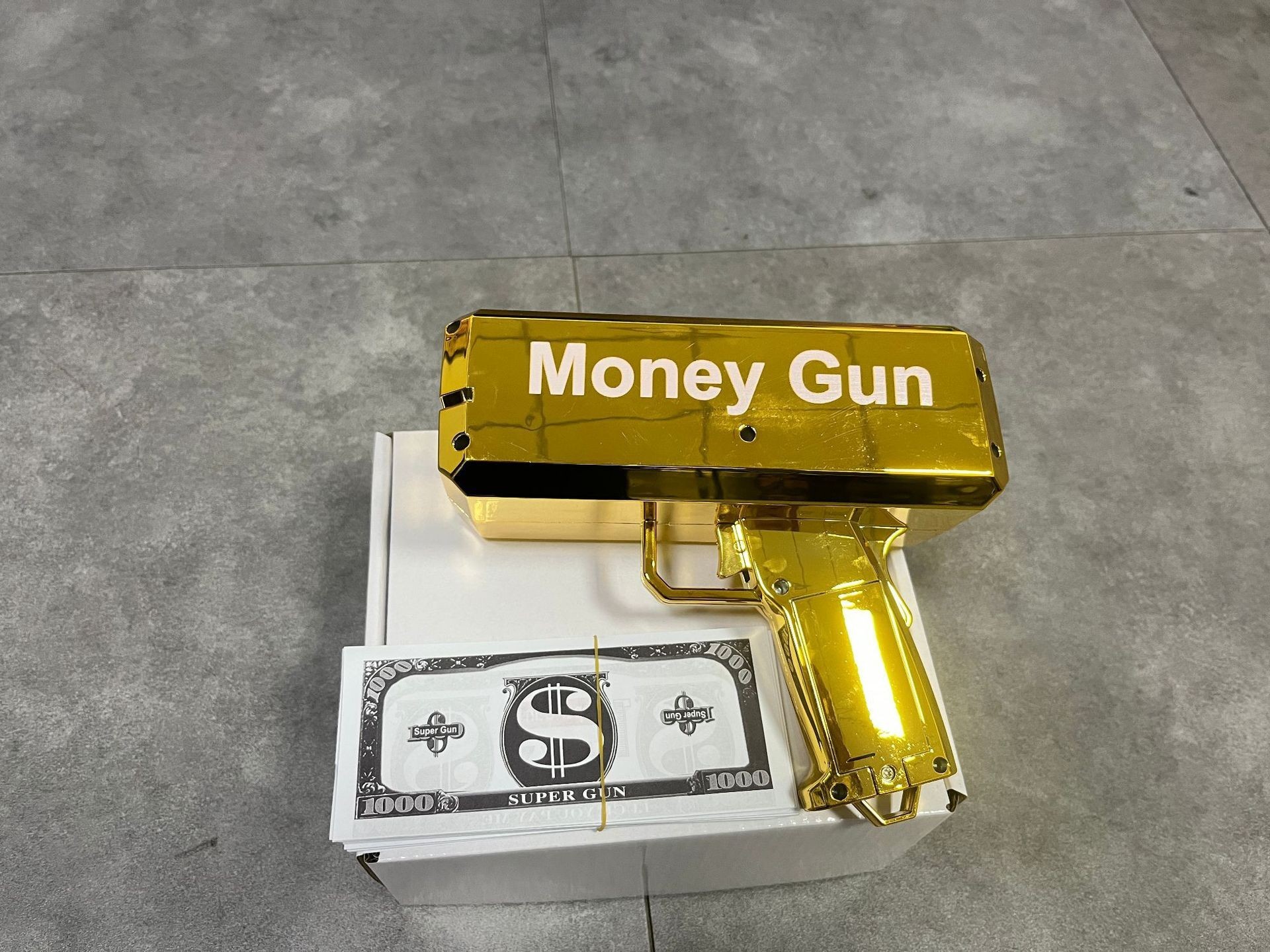 PISTOLA DE PULVERIZACIÓN de dinero de oro con pistola de dinero + 100 hojas de papel moneda
