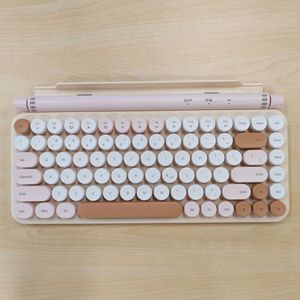 Lindo teclado Bluetooth Delgado Estilo mecánico Modo dual 2,4G Inalámbrico Bluetooth Teclado de tecla redonda para iPad con ranura para tarjeta - Product Image 6