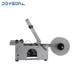 Etichettatrici manuali semi automatiche orizzontali piccole per lattine di vasetti di bottiglie di birra per alimenti rotondi con funzione di codifica - Product Image 4