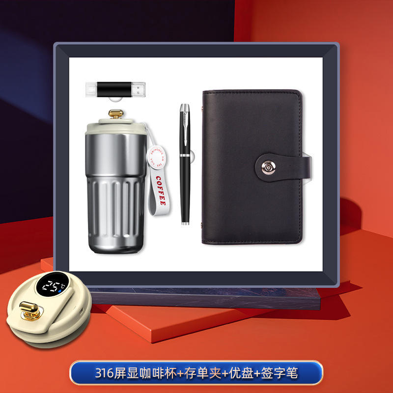 Ensemble quatre pièces noir : tasse à café, porte-dépôt, stylo, clé USB