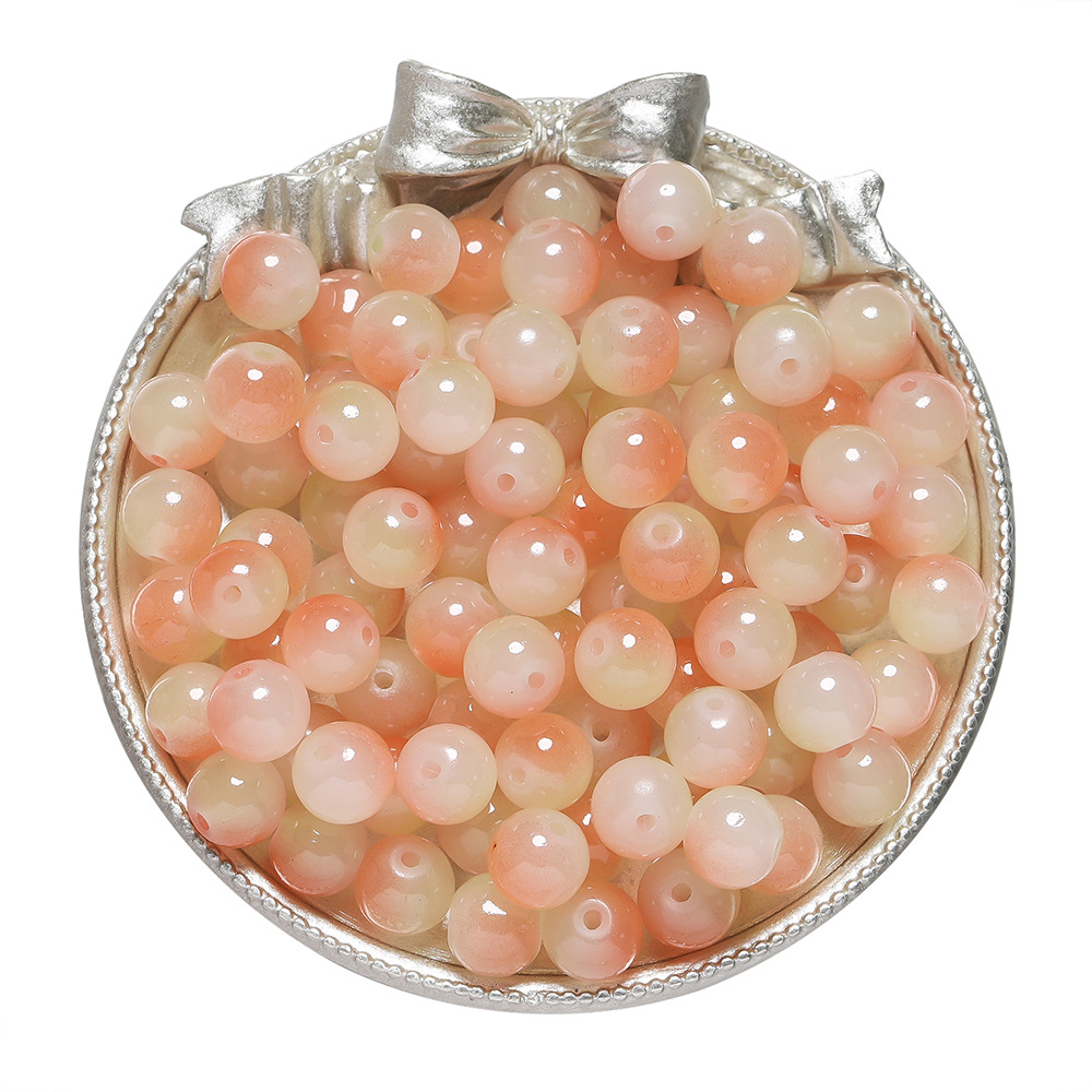 Perles imitation jade en verre bicolore - orange-jaune
