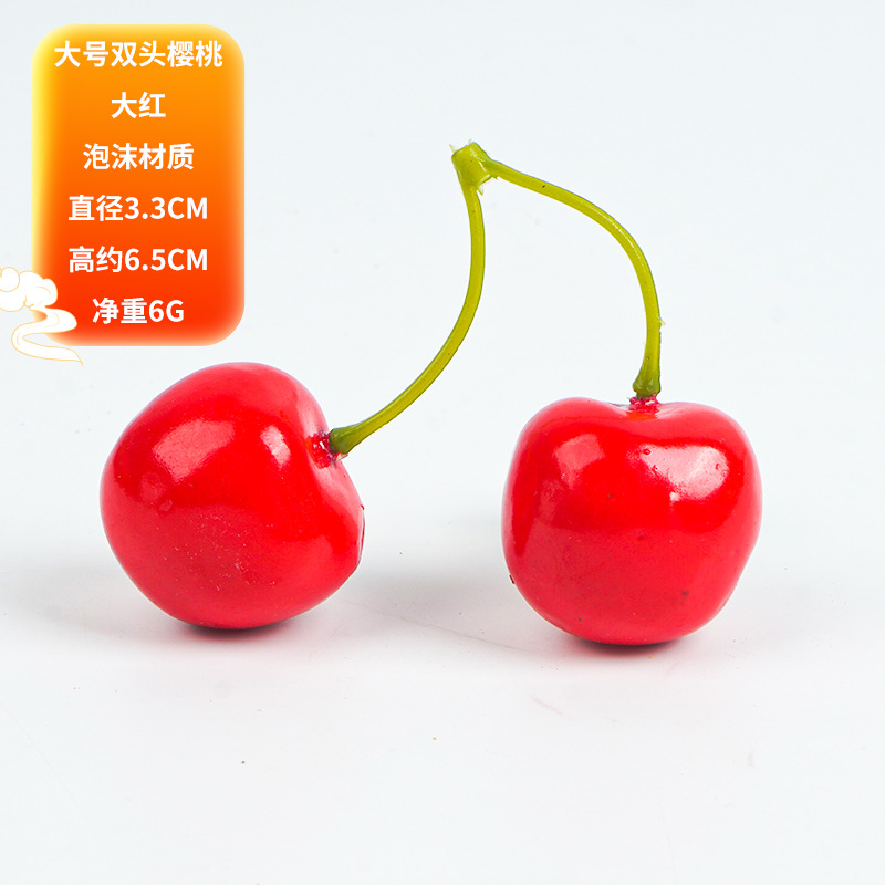 Grandes cerises à double tête en rouge vif