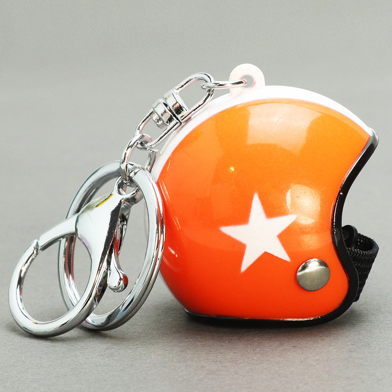 Chapeau orange étoile blanche