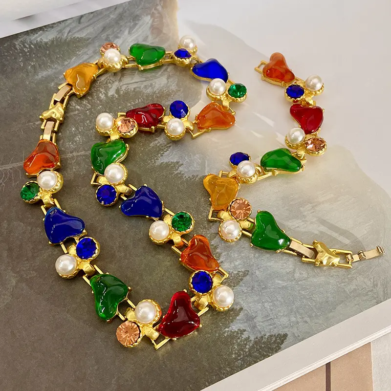 Set di gioielli in stile palazzo di lusso Vintage francese con perla e cuore placcato in oro bracciale collana maglione gioielli a catena per le donne