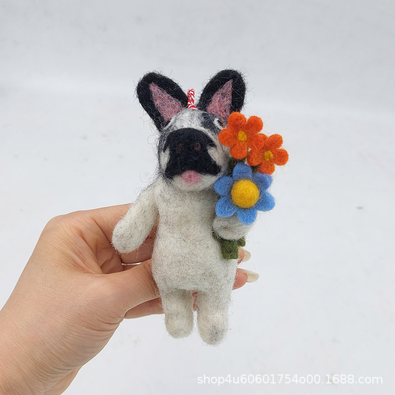 Dog holding flowers
