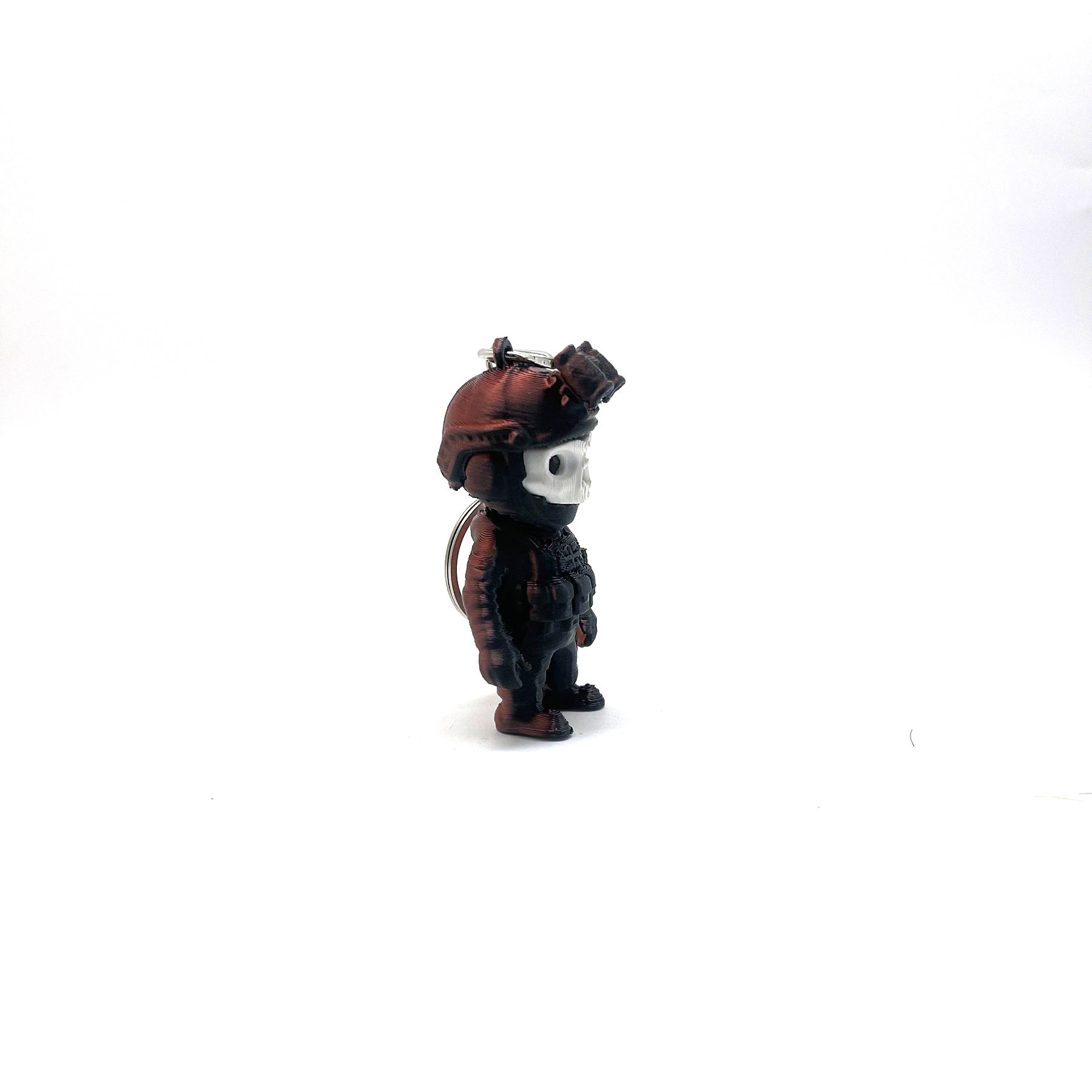porte-clés figurine militaire noir et rouge