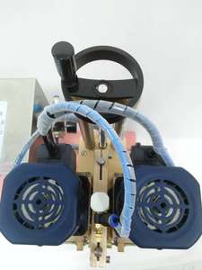 Riempitrice e tappatrice per bottiglie con tappo a vite per ispezione - Product Image 6