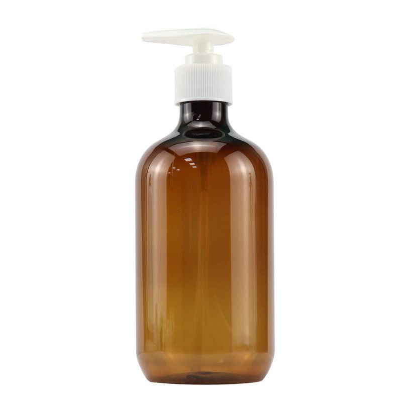 Bouteille marron à dessus blanc