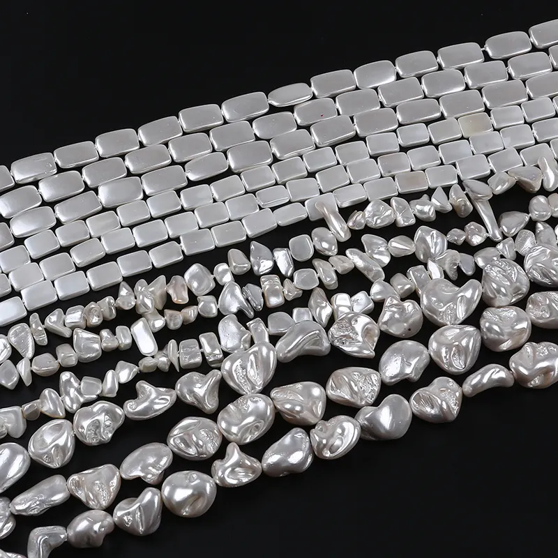 Cuentas sueltas de perlas con forma ovalada, color blanco Natural, venta al por mayor