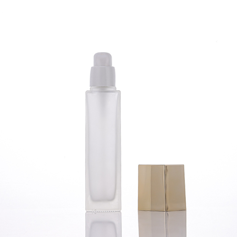 Frosted Bottle with Gold Pump Cap