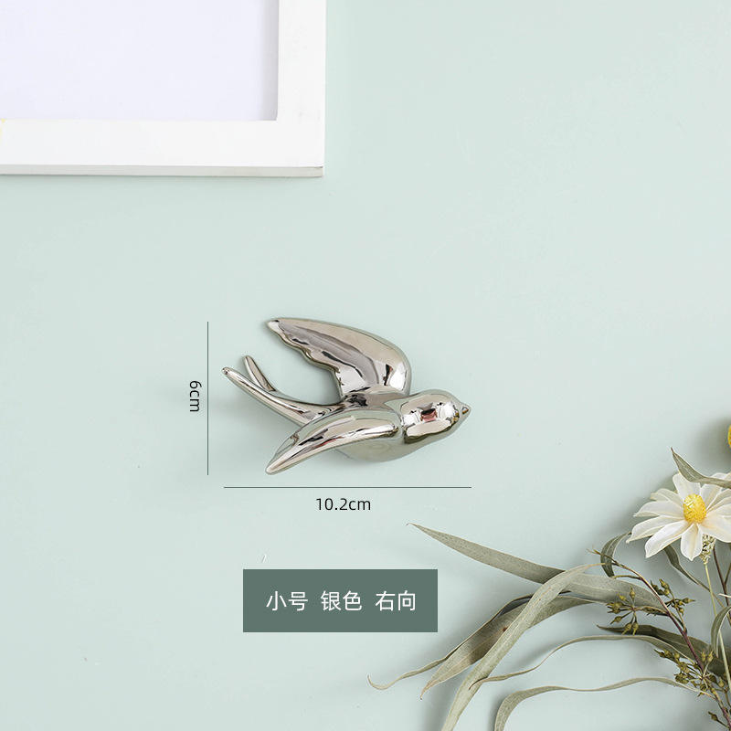 The silver trumpet faces right.