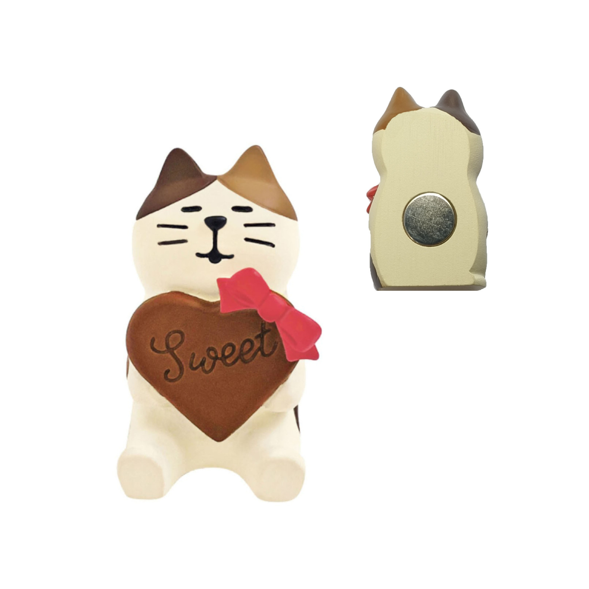 Heart-shaped cat on the fridge