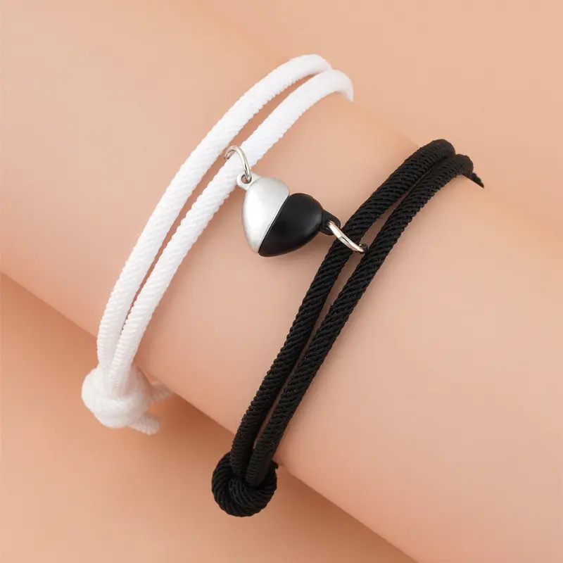 Moda moda negro blanco en forma de corazón cuerda magnética pulsera trenzada parejas novias pulsera ajustable