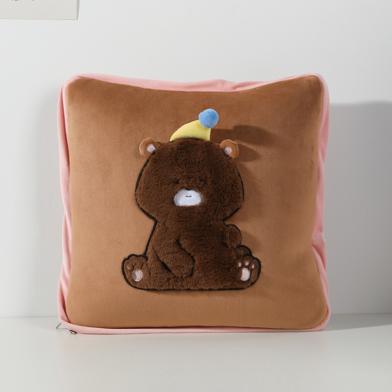 หมอนอิงสีน้ำตาลพร้อมผ้าห่ม