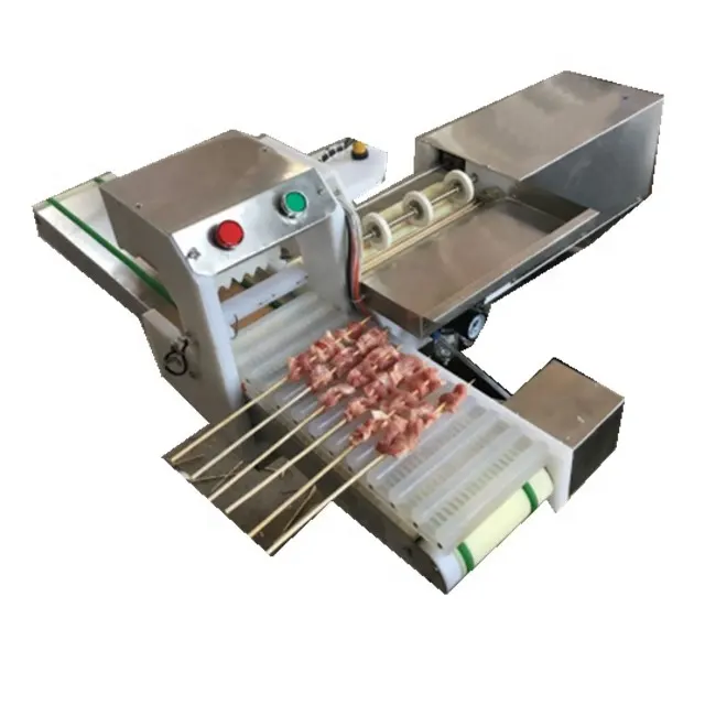 automatic machine to put meat on sticks for barbecue
