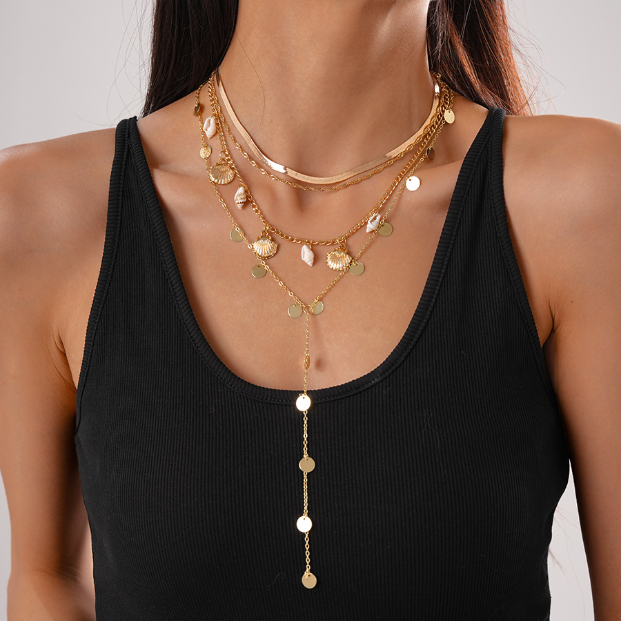 3 # collier-or (quatre pièces)