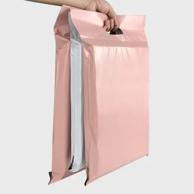 ถุงไปรษณีย์สีชมพูพร้อมหูหิ้วสำหรับใส่เสื้อผ้าพิมพ์ลายไดคัท
