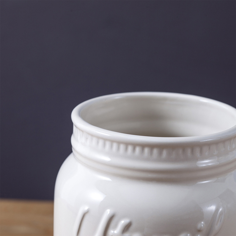Ceramic sealed jar pure white creative embossed tea ceramic jar custom LOGO ceramic storage storage jar