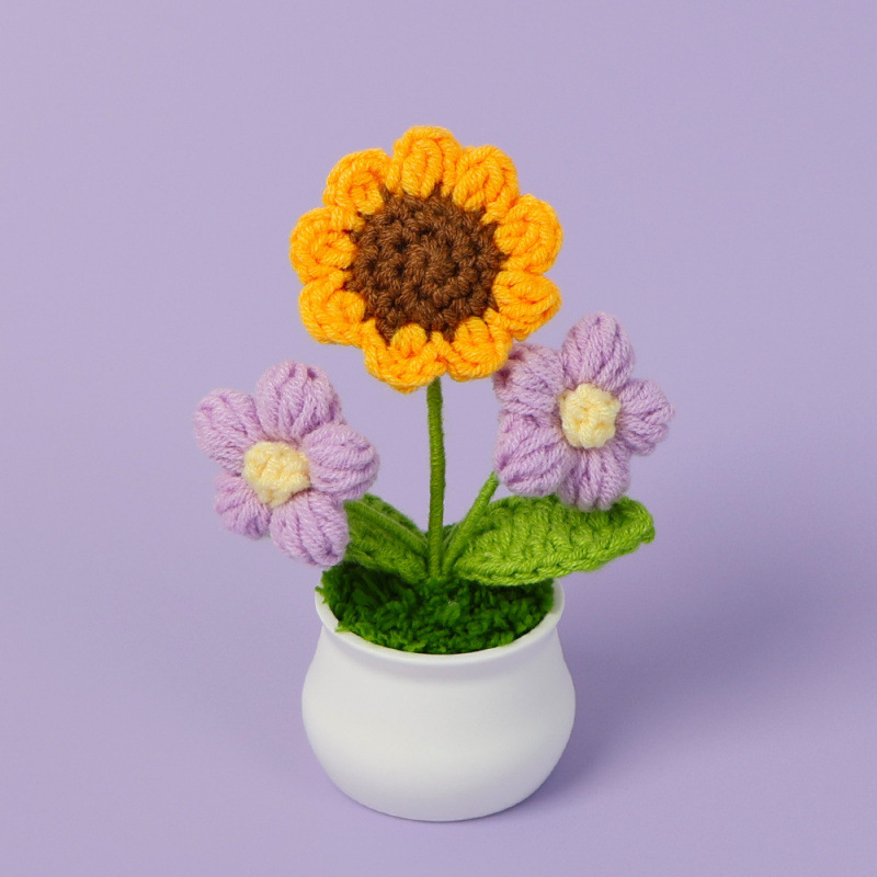 Petite plante en pot double tournesol violet