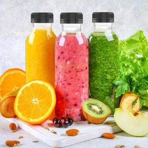 カスタムロゴジュースボトルプラスチック製の冷たい飲料飲料透明な再利用可能な容器透明な牛乳瓶空のプラスチックジュースボトル