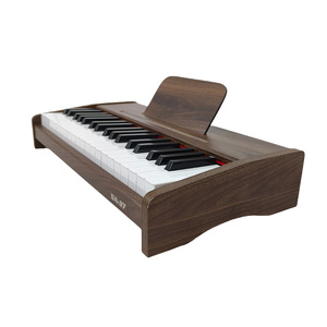 Rendimiento profesional Piano simulado de 37 teclas Mini teclado electrónico de 2,2 centímetros Sensor táctil de madera