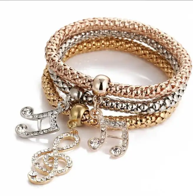 HZS61A18-5 moda braccialetti elastici con ciondoli gioielli placcati oro e argento nota musicale bracciali a catena con strass