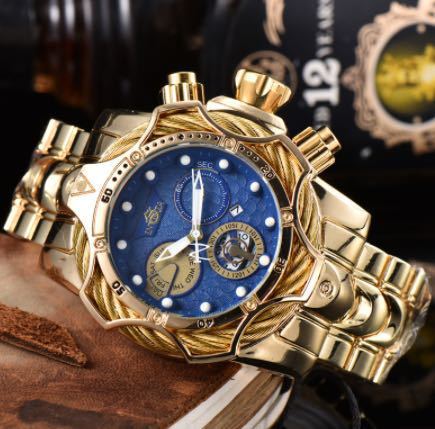 Gold case-gold filigree-blue dial