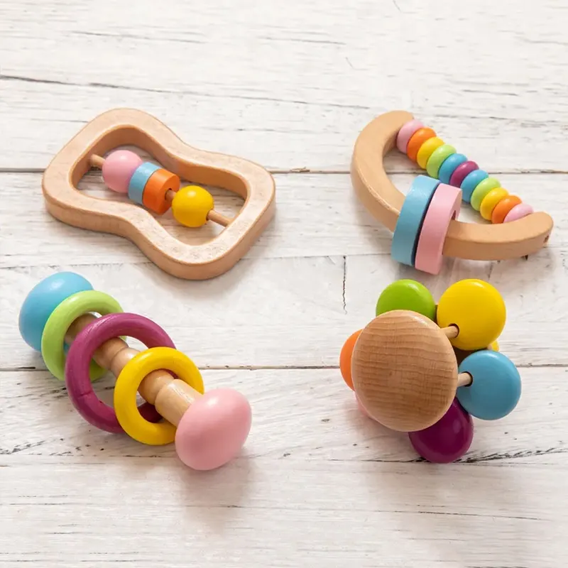 Juego de sonajero de bebé colorido orgánico de 4 piezas, sonajero de madera de grado alimenticio seguro, pulsera, juego de mordedor, juguete Montessori para niños pequeños