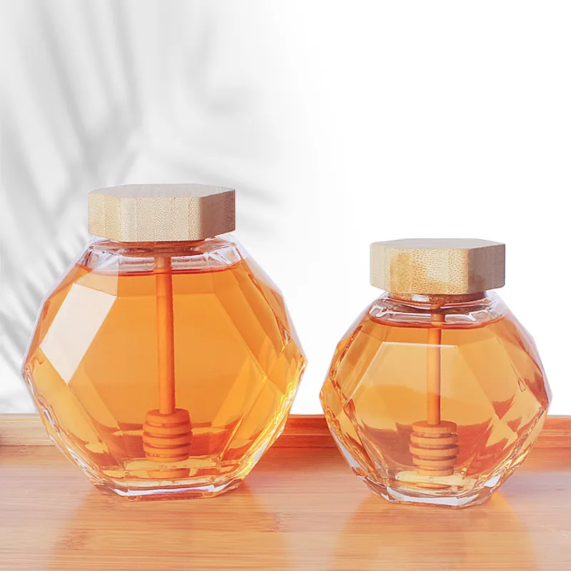 Lege Zeshoekige Glazen Pot Food Grade Glas Verpakking Verzegelde Blikken Zeshoekige Honing Potten Met Houten Dipper