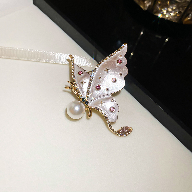 121# broche-papillon doré
