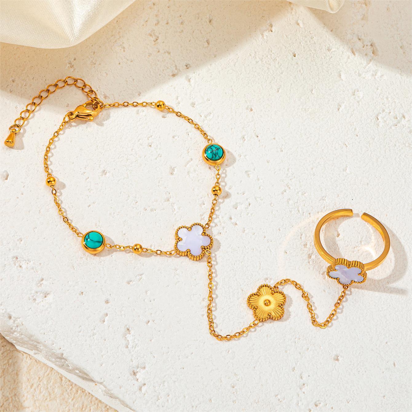 Bracelet de mitaines de fleur de coquille d'acier au titane