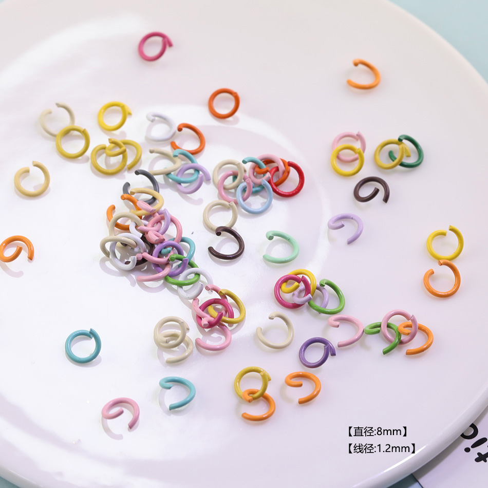 Light-colored open-back rings (100 pieces)