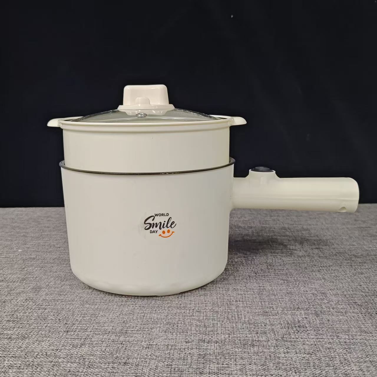Stainless steel + plastic steaming rack.