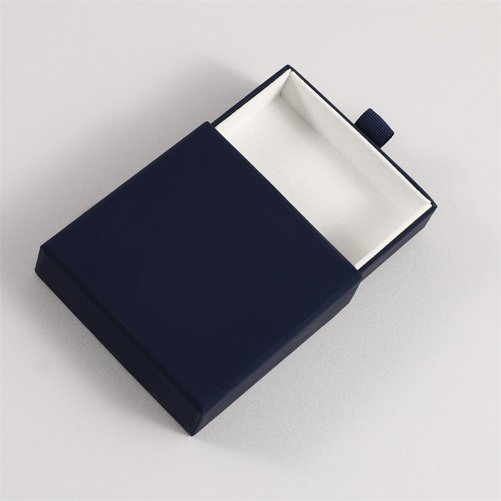 Navy blue box with white lining