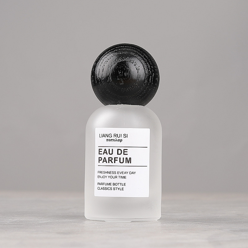 Sanded black wooden round ball