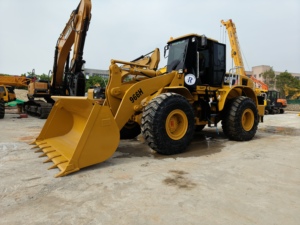 CAT 966H многофункциональный погрузчик номинальная нагрузка 6 тонн мощность двигателя 195 кВт уникальные особенности