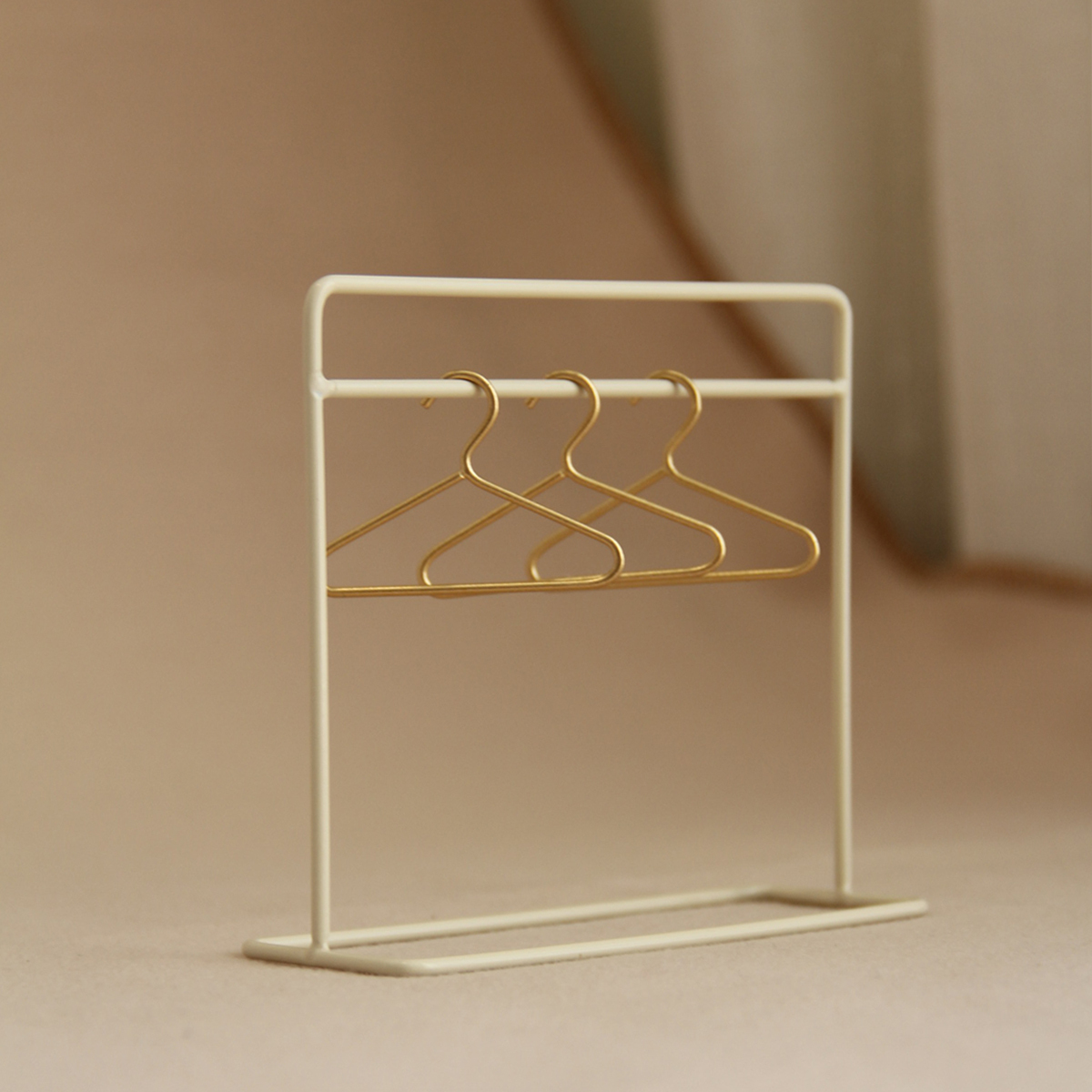 Ivory standing coat rack