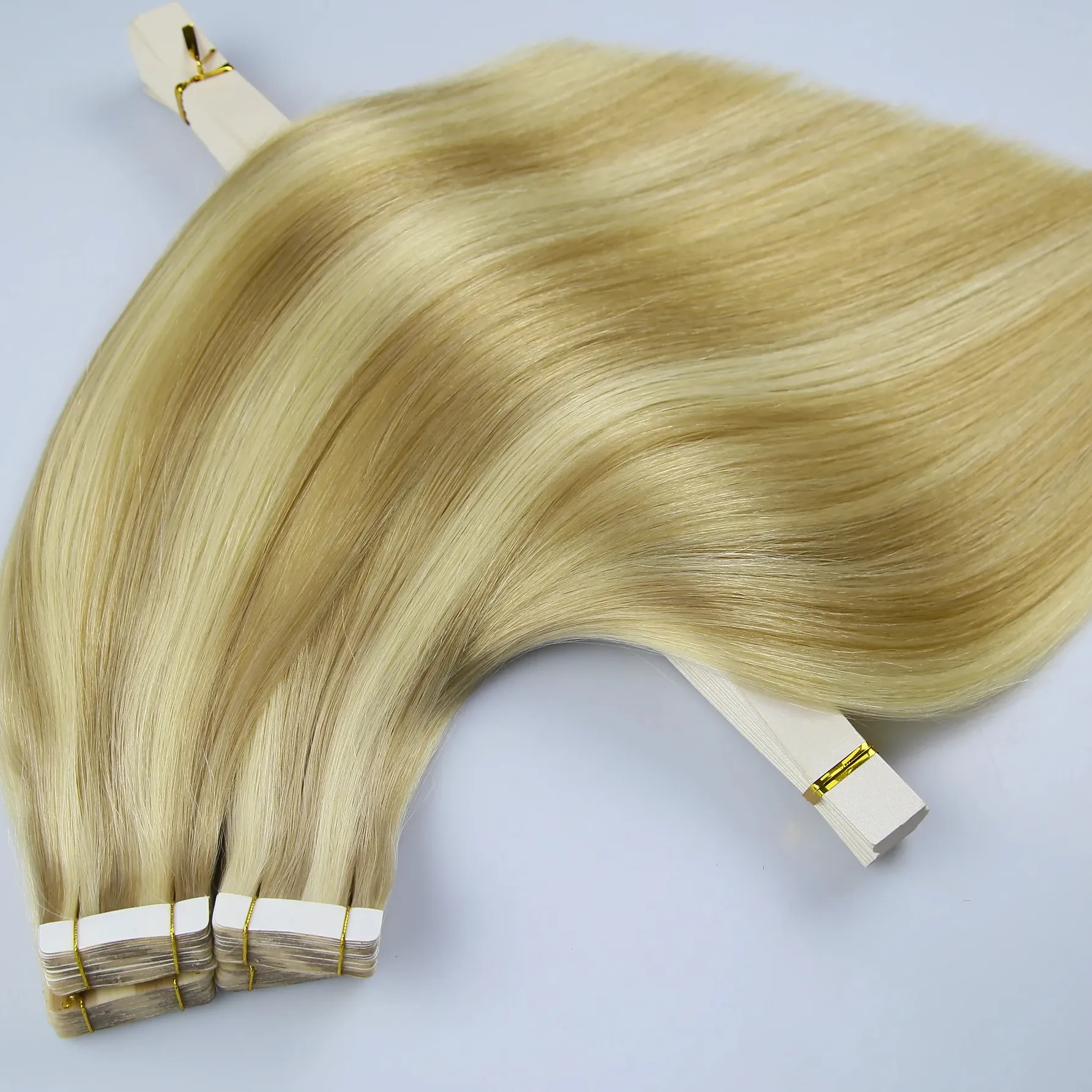 Vente en gros 20 pièces par paquet extensions de cheveux à bande invisible, produit de cheveux humains européens bruts à rapport élevé pour femmes blanches