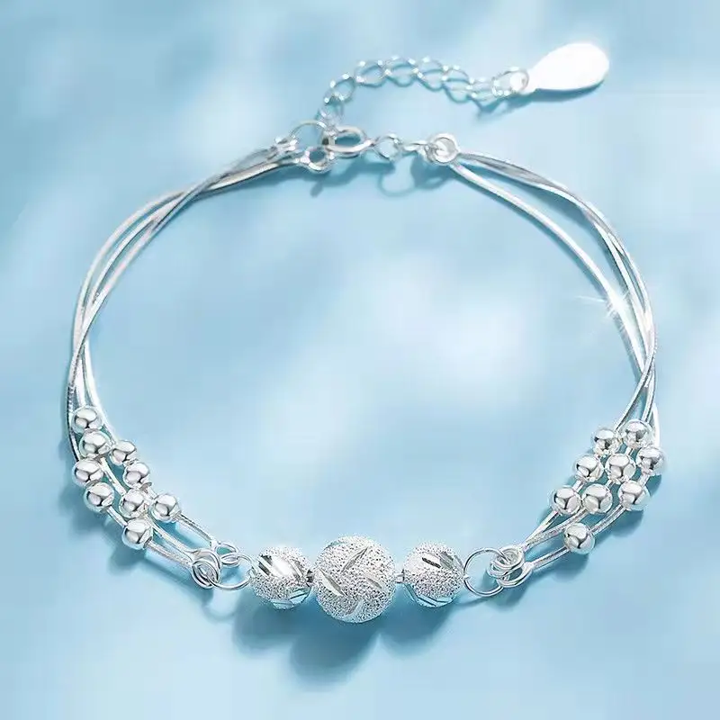Braccialetto multistrato di Design di nicchia gioielli placcati in argento da donna semplice lusso leggero squisito nuovo braccialetto di perline intagliate