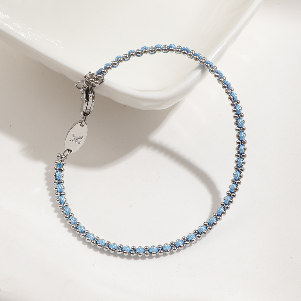 bracelet en corde bleue tressée couleur acier
