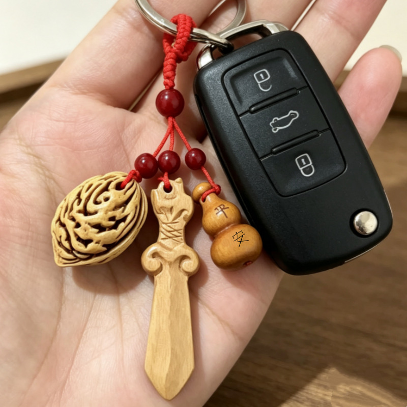 Pendentif hibou pêche