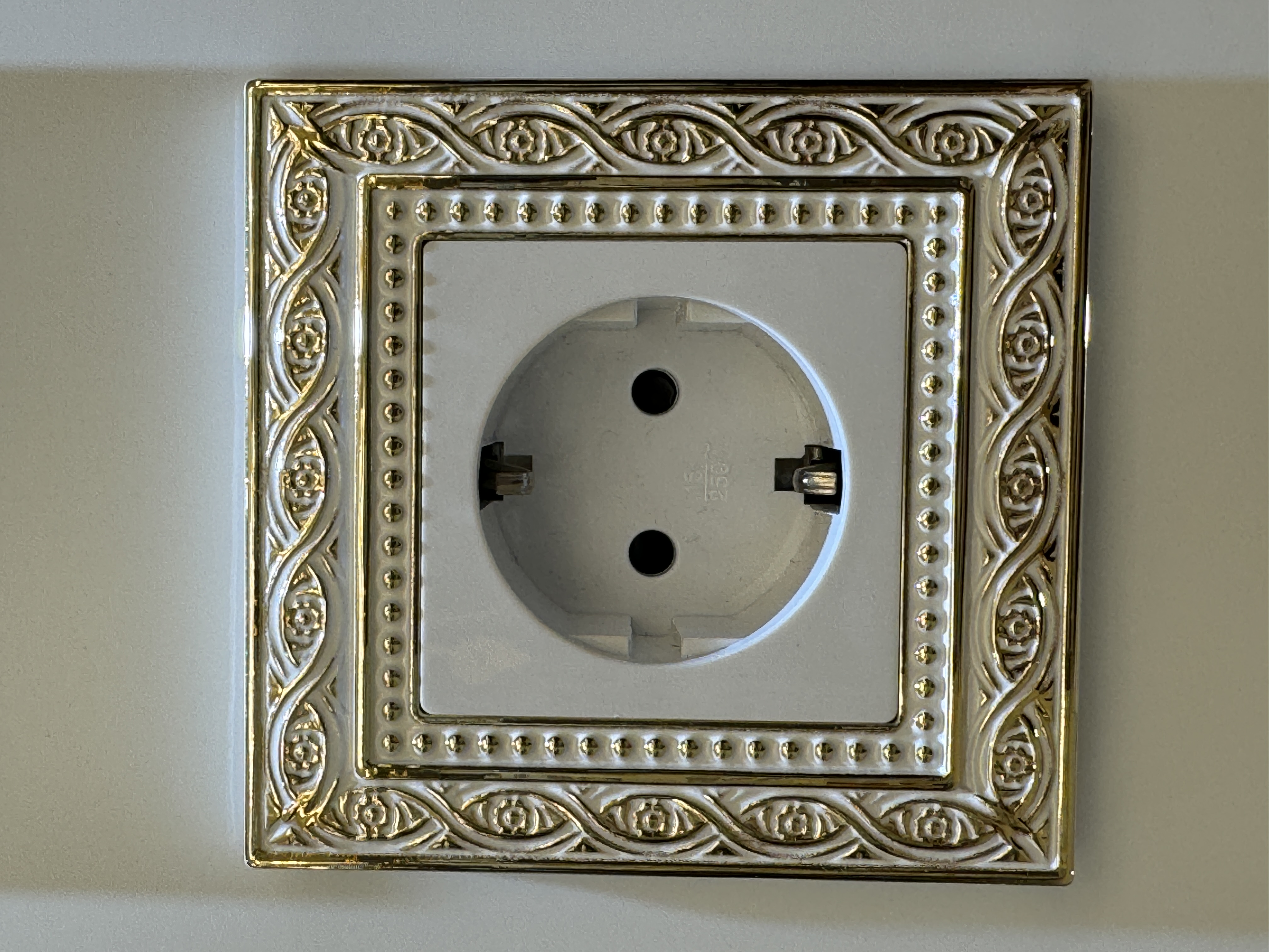 European socket white with gold color